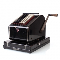 Tšekimasin Todd Protectograph